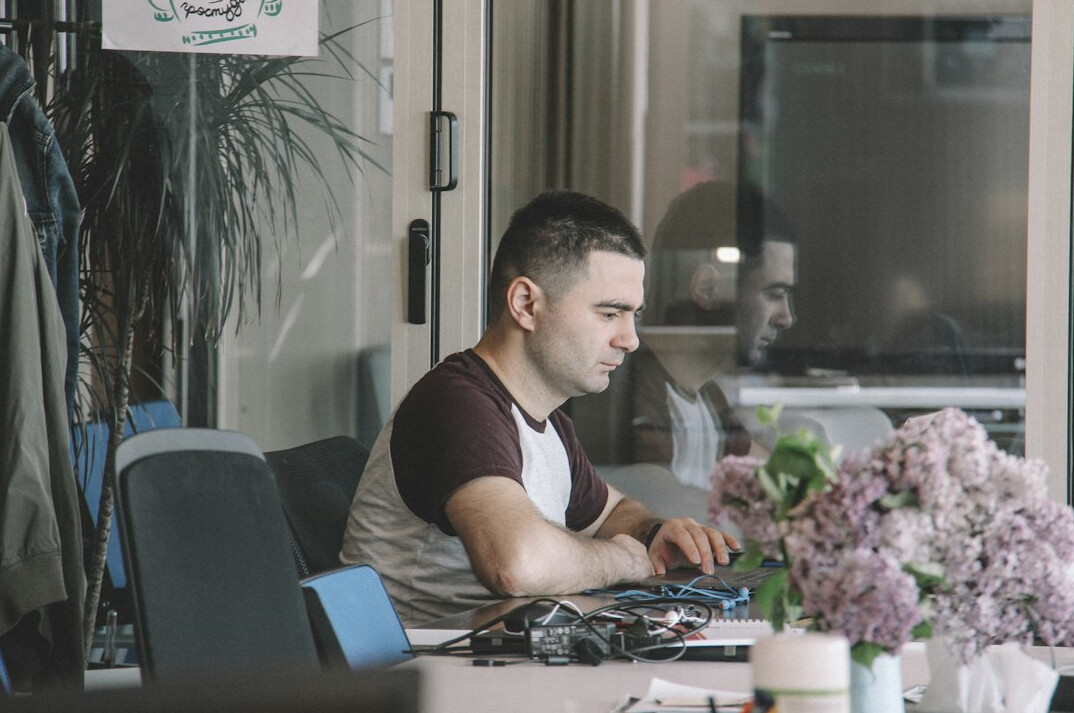 insurance software developer at desk