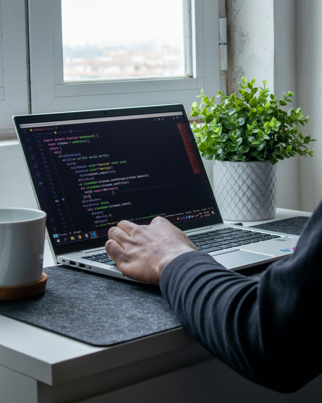 software engineer writing insurance code