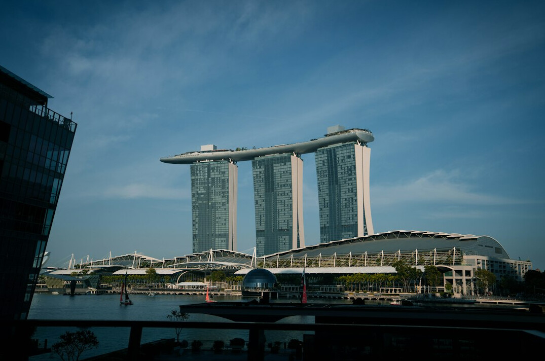 Modern glass office building exterior in Singapore's business district